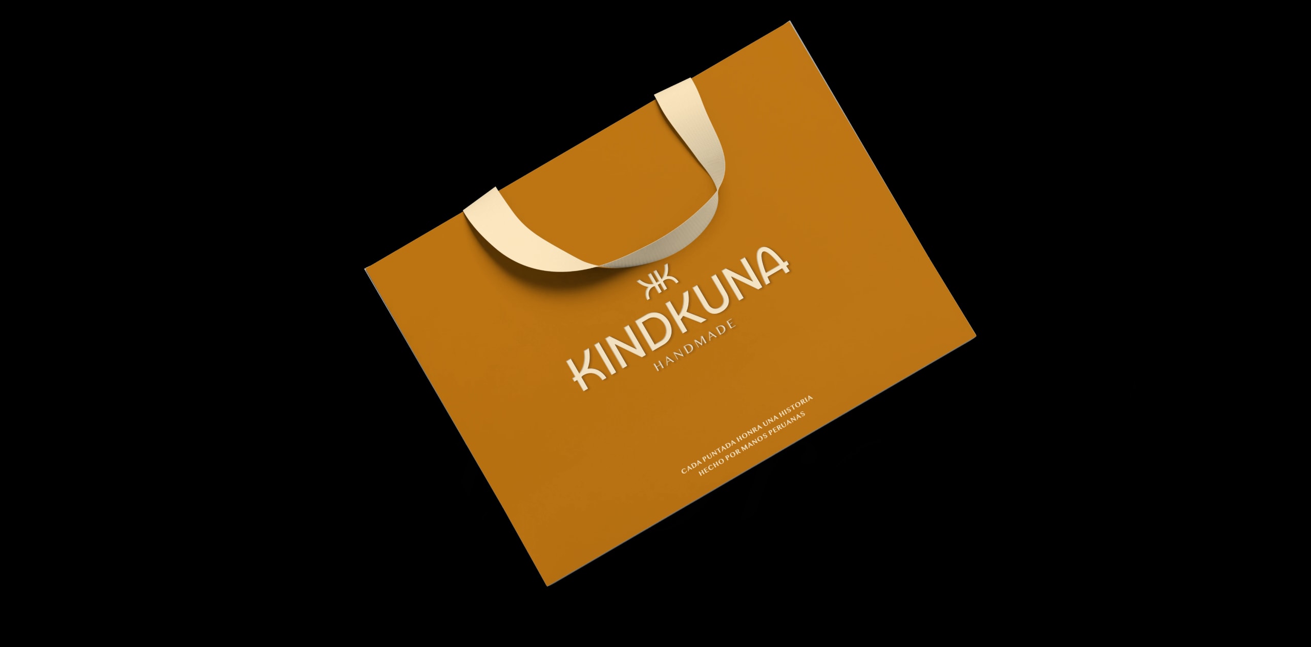 Presentpåse för Kindkuna, formgiven av BeBranding, framför orden ”iconic brands”